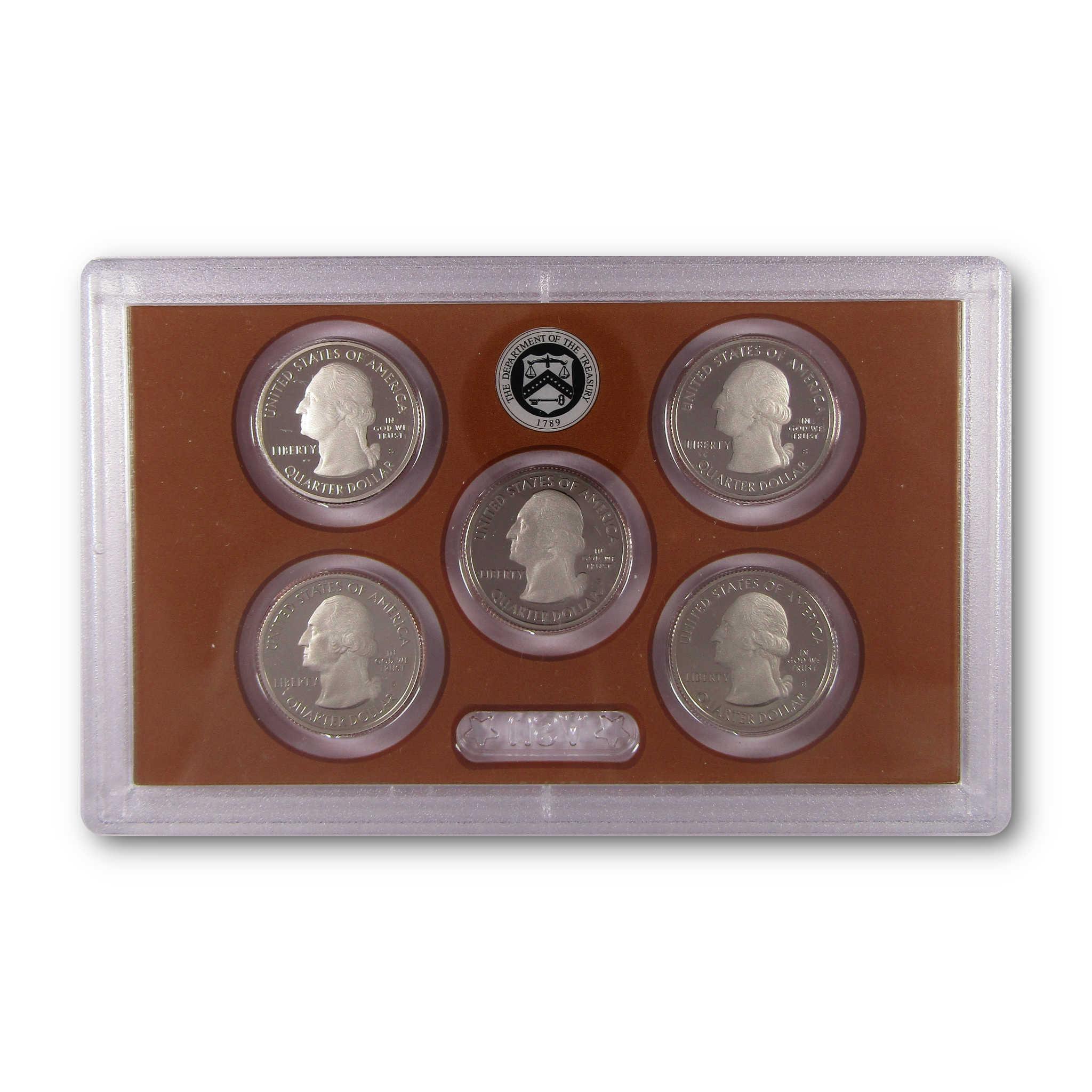 Set of five collectible US quarter coins in a plastic display case with brown background