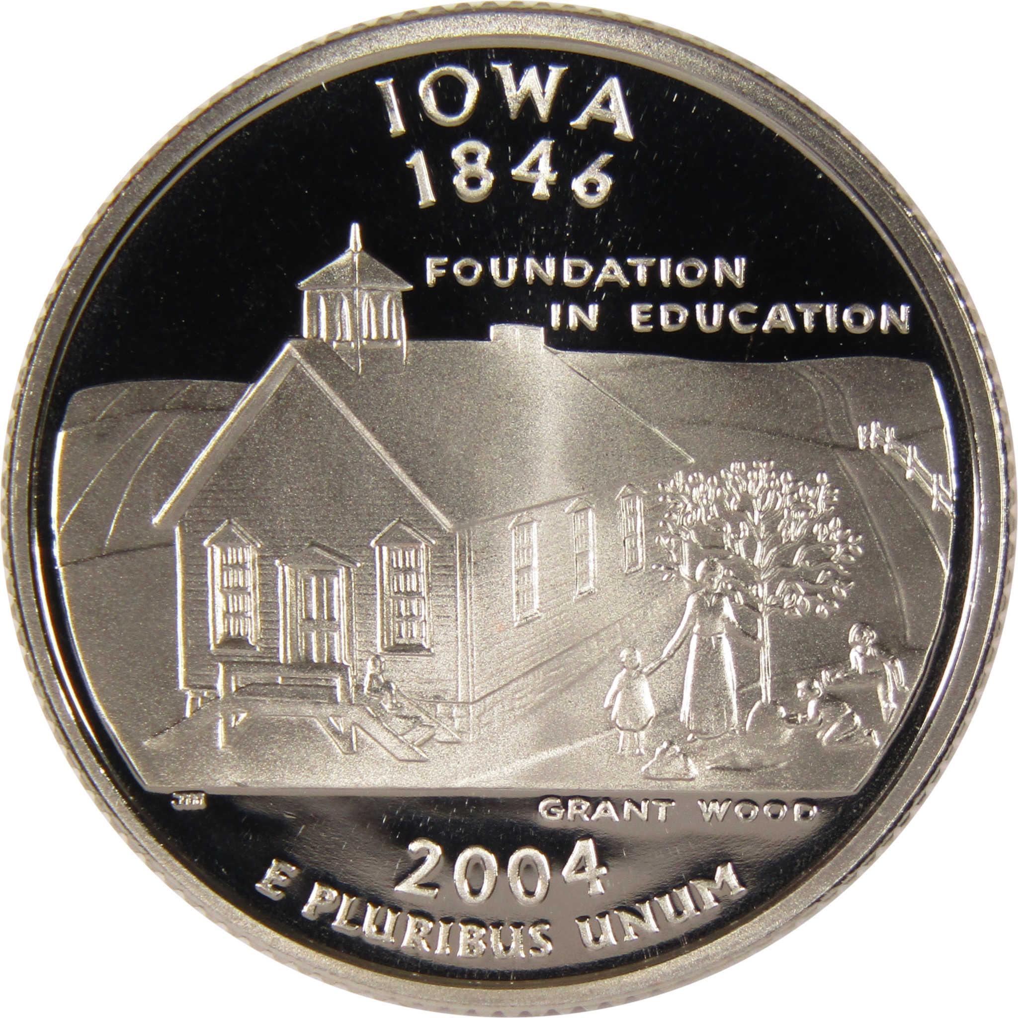 Iowa 1846 commemorative coin featuring a schoolhouse, children, tree, and 'Foundation in Education' text.