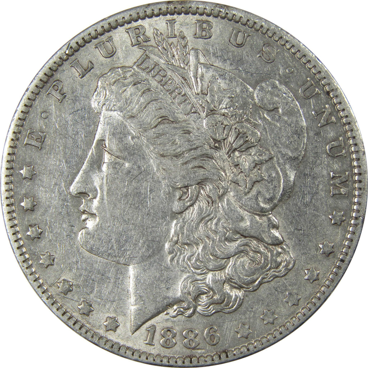 1886 O Morgan Dollar AU About Uncirculated Silver $1 Coin SKU:I23697 - Morgan coin - Morgan silver dollar - Morgan silver dollar for sale - Profile Coins & Collectibles