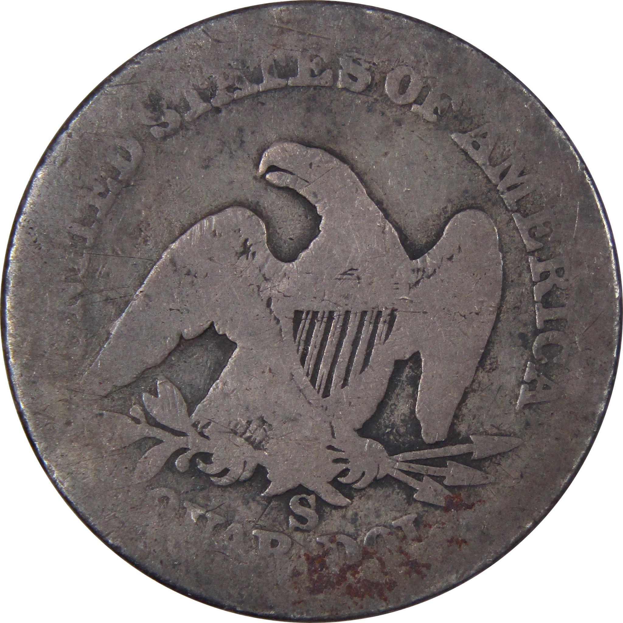 Antique silver coin with eagle, shield, and olive branch design, United States mint mark visible
