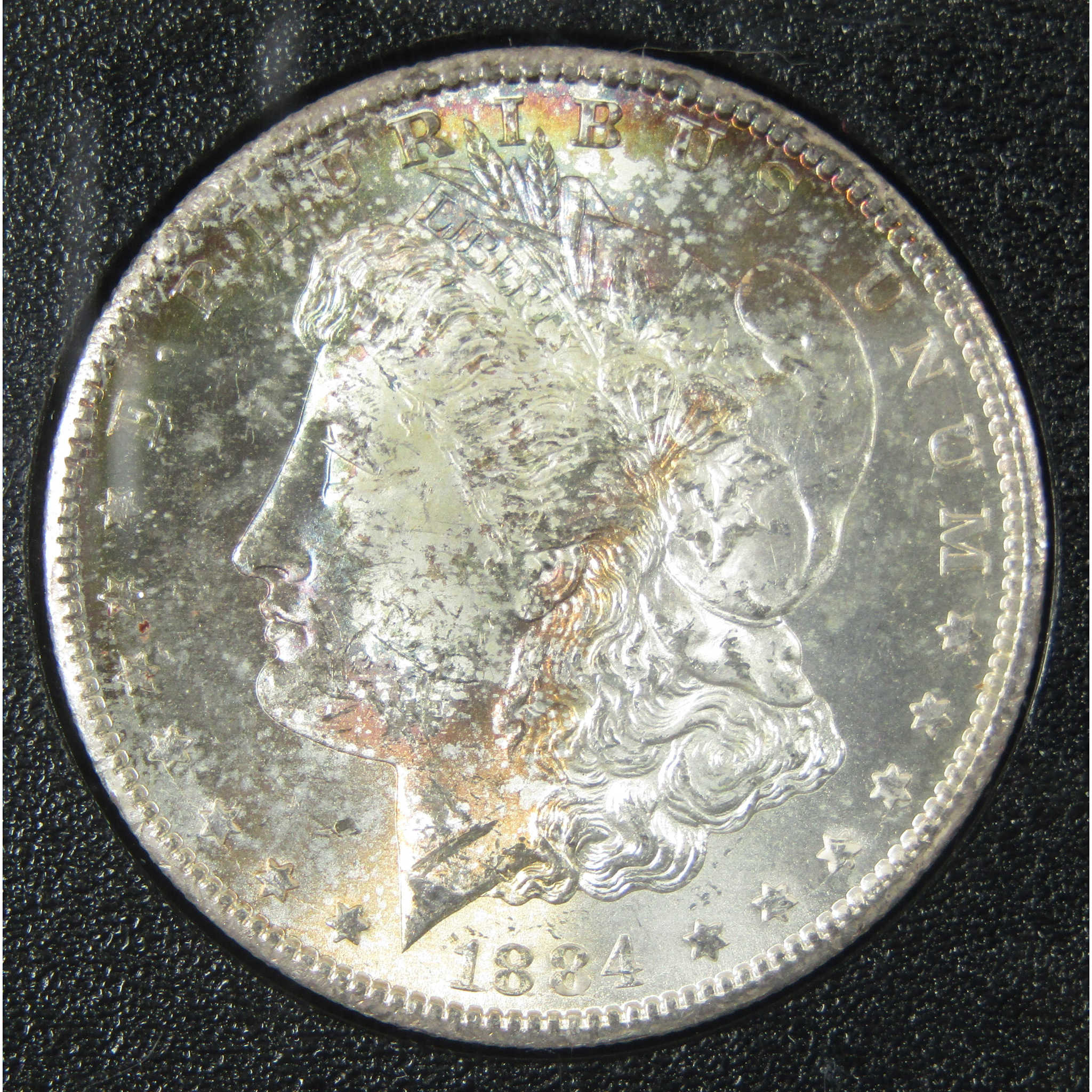 1884 CC GSA Morgan Silver $1 BU Choice Uncirculated Toned SKU:CP1607