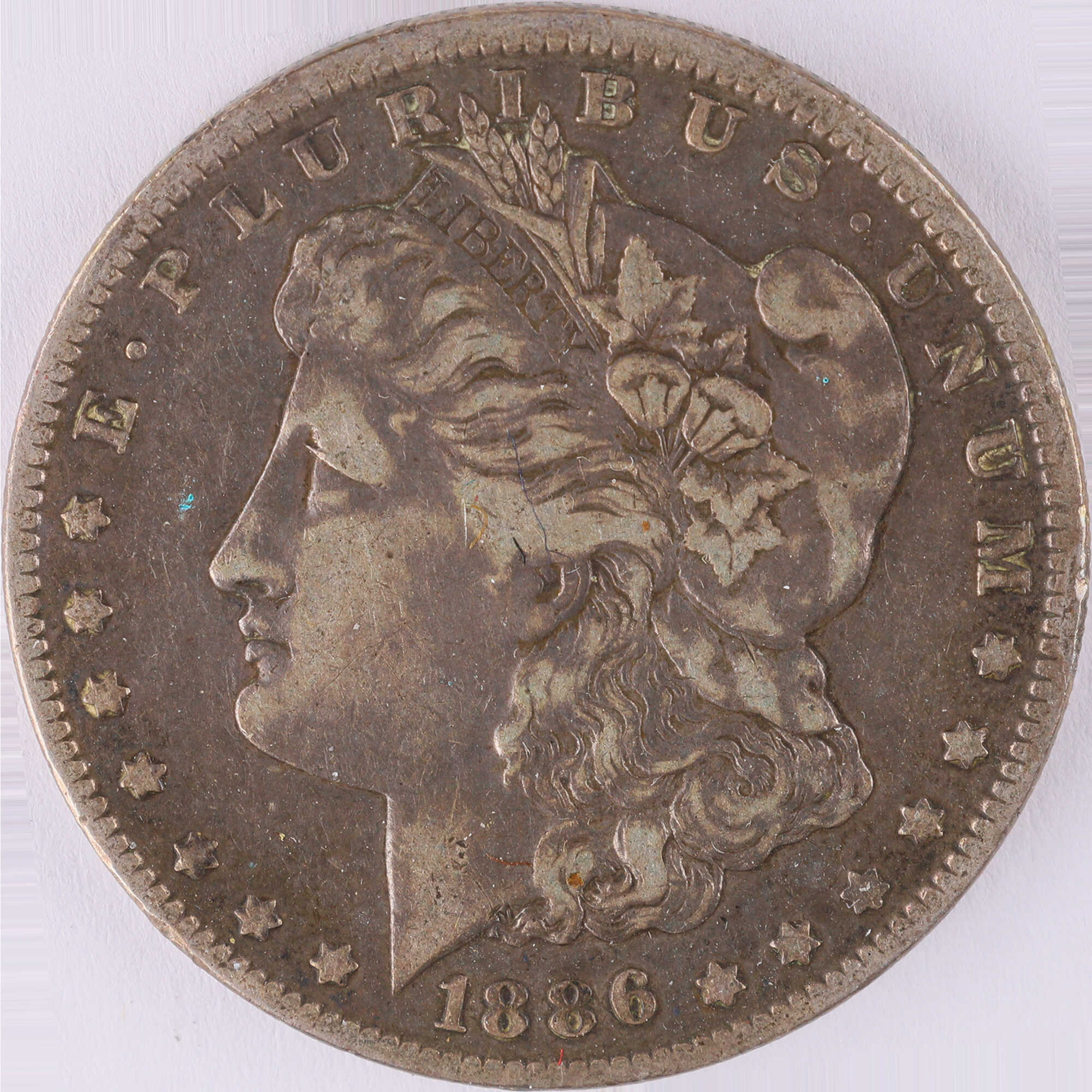 1886 O Morgan Dollar VF Very Fine Silver $1 Coin SKU:I12037 - Morgan coin - Morgan silver dollar - Morgan silver dollar for sale - Profile Coins & Collectibles