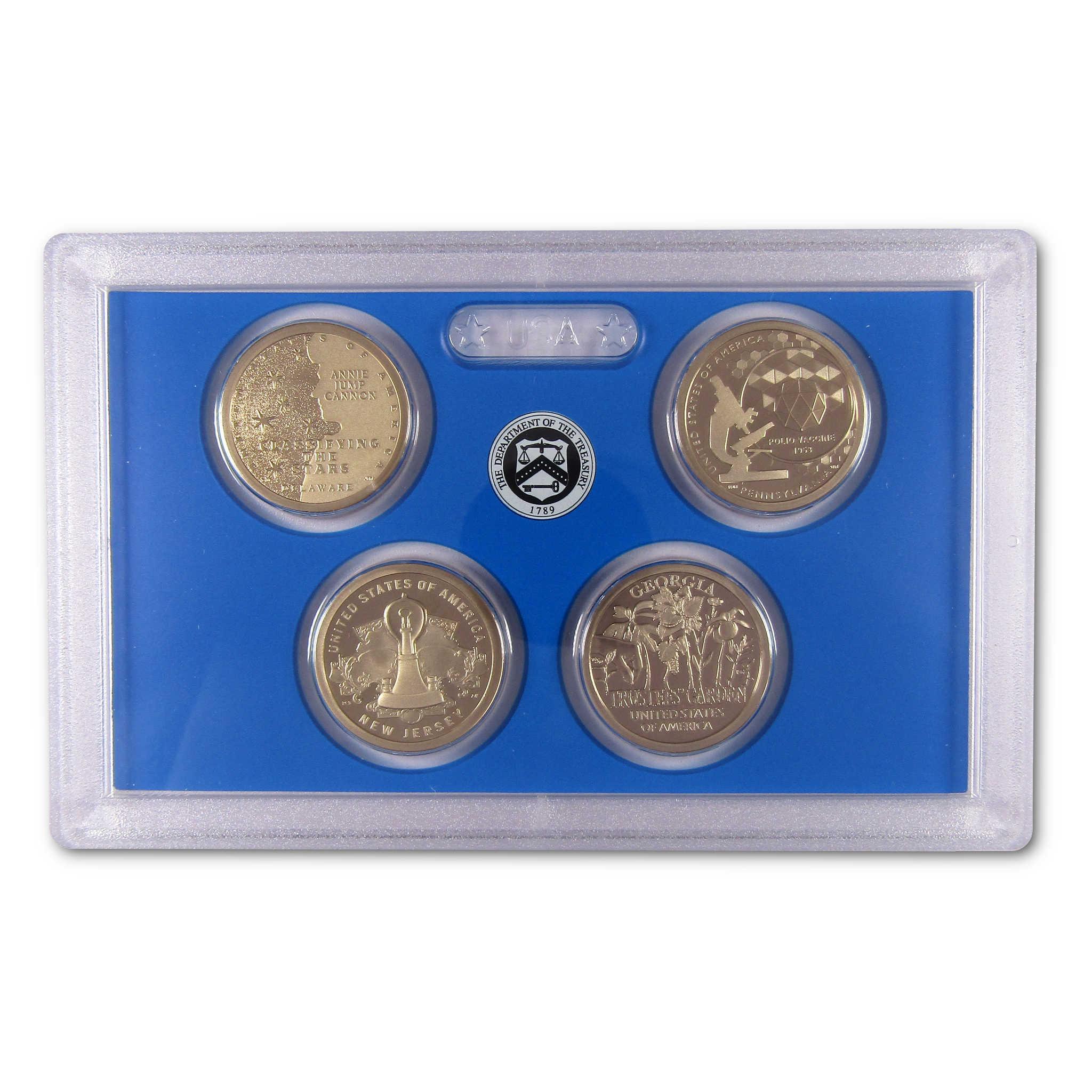 Four collectible US coins in a clear display case with blue background, Department of Treasury seal