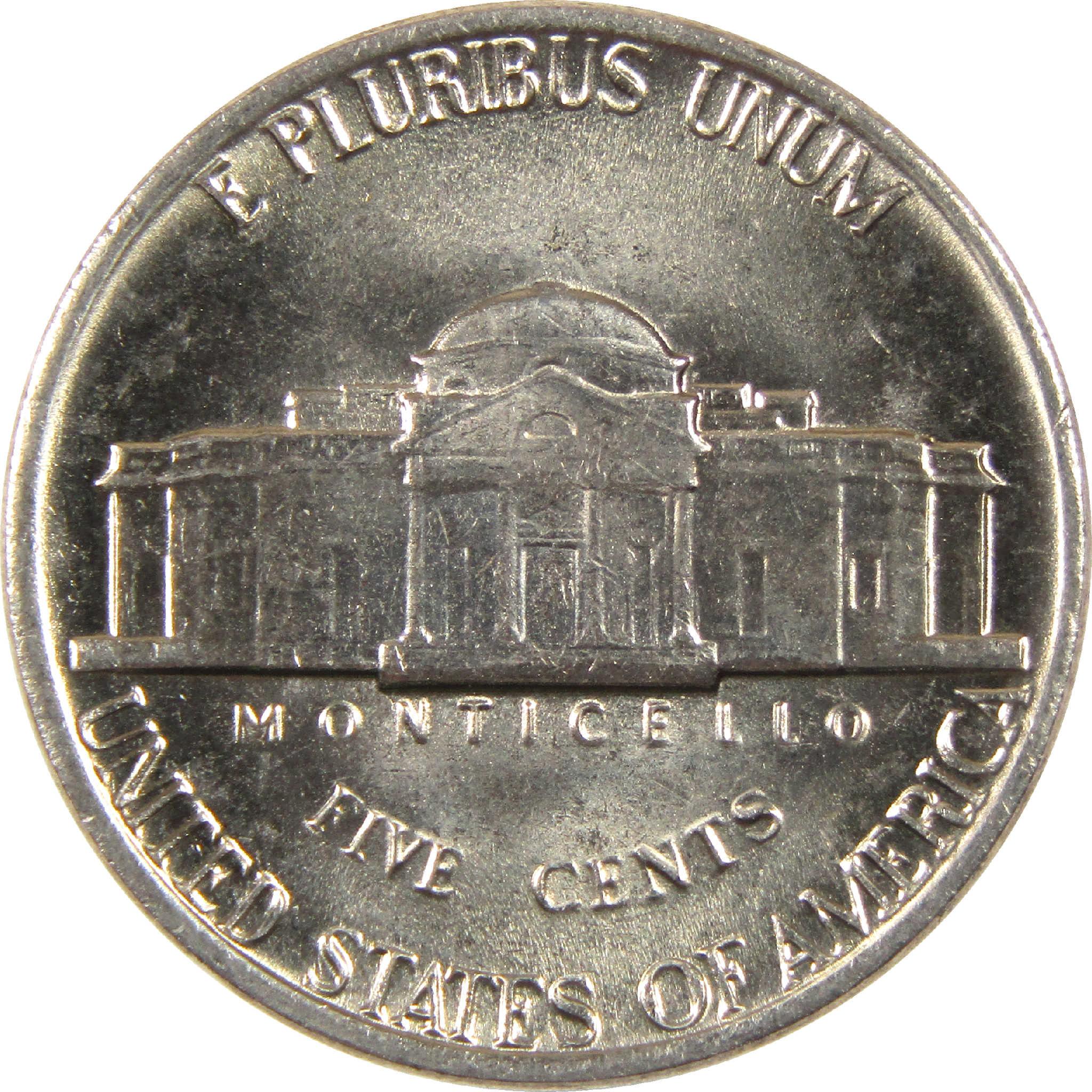 Reverse side of US nickel coin showing Monticello with inscriptions and silver finish.