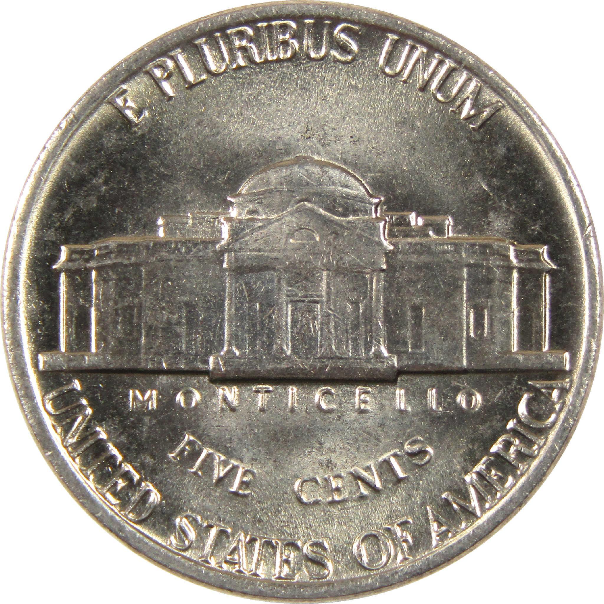 Reverse side of US nickel coin showing Monticello with inscriptions and silver finish.