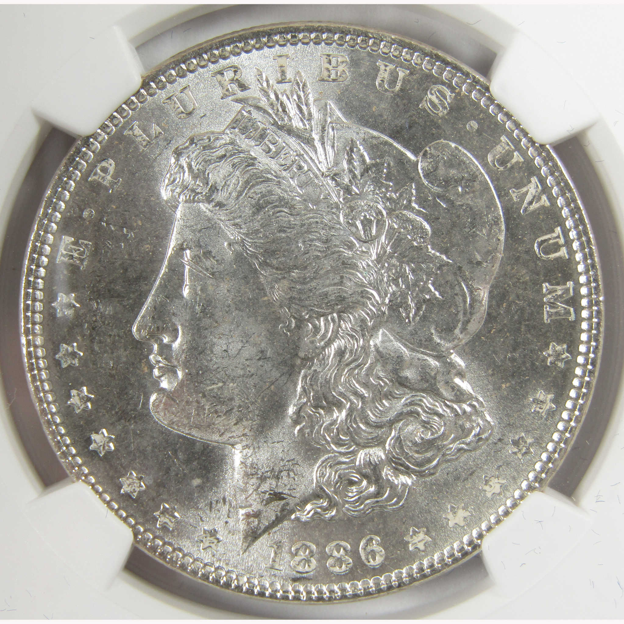 1886 Morgan Silver Dollar MS 63 NGC Uncirculated $1 Coin SKU:CP793 - Morgan coin - Morgan silver dollar - Morgan silver dollar for sale - Profile Coins & Collectibles
