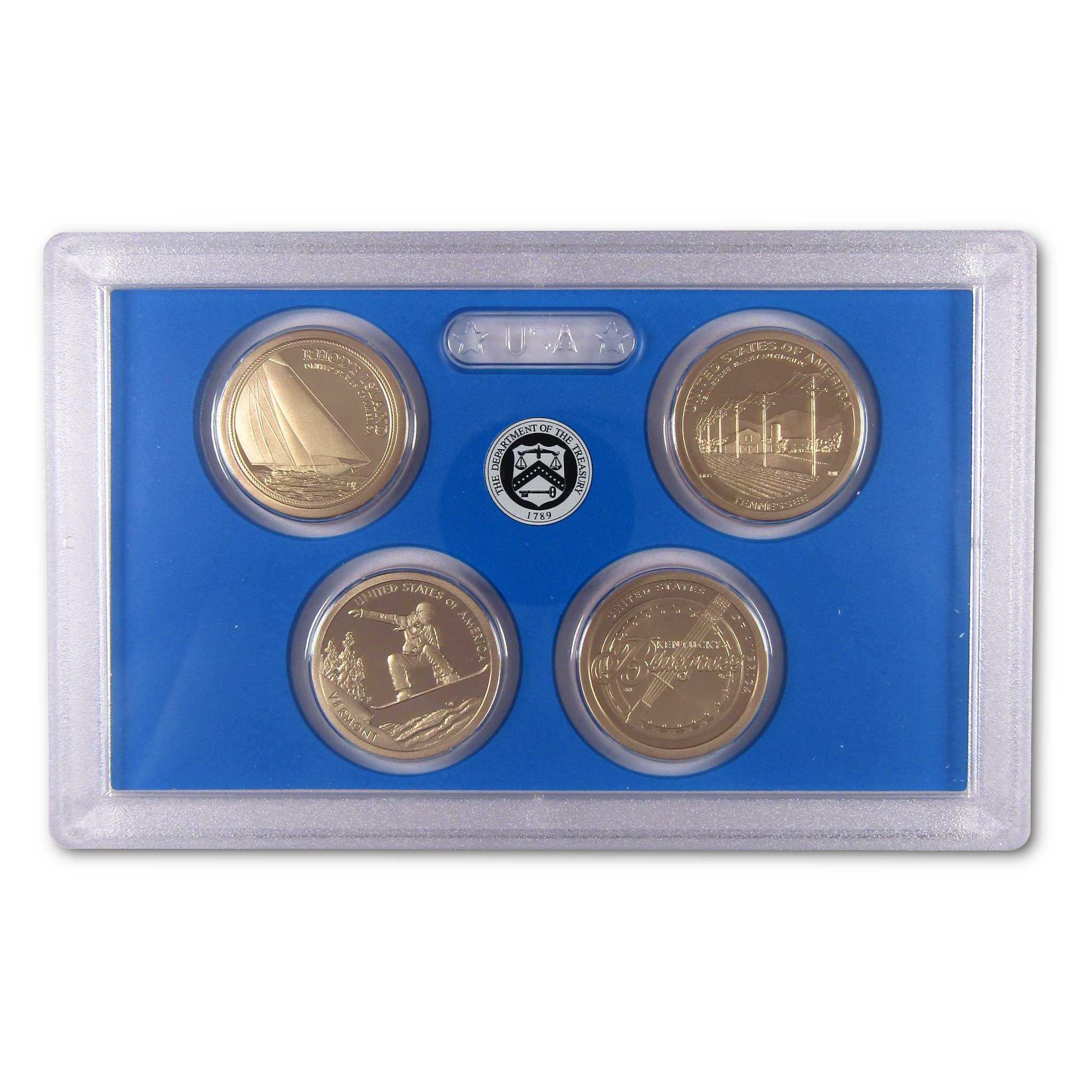 US collectible coin set in plastic case with blue background, four gold coins displayed.