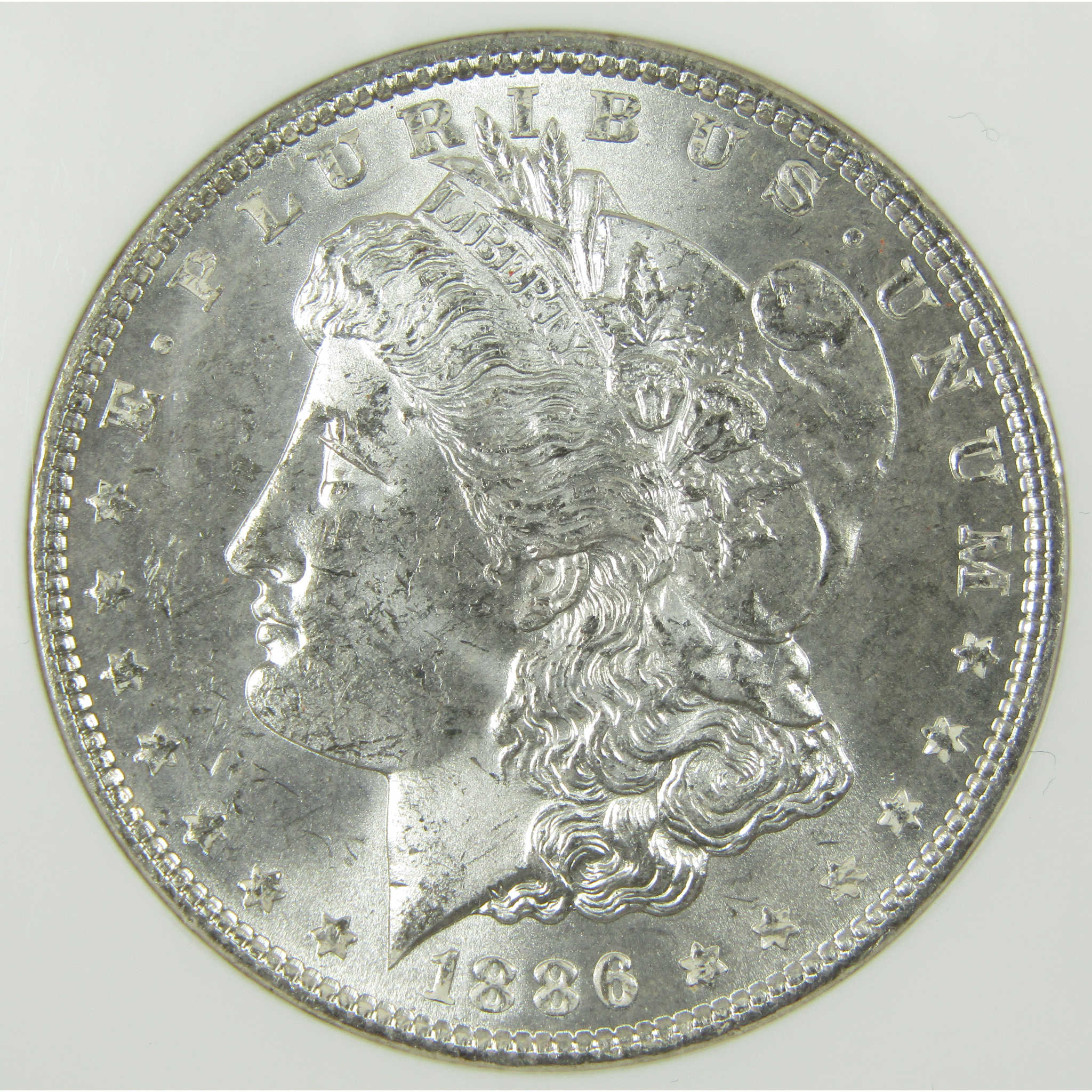 1886 Morgan Silver Dollar MS 63 NGC Uncirculated $1 Coin SKU:CP1675