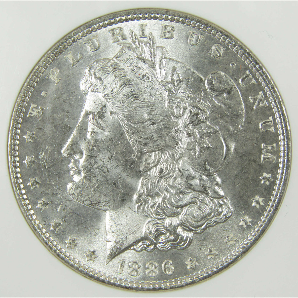 1886 Morgan Silver Dollar MS 63 NGC Uncirculated $1 Coin SKU:CP1675